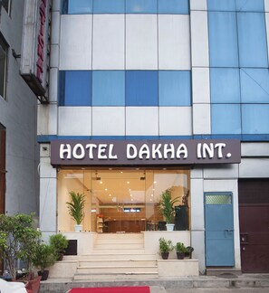 A building with a sign reading "HOTEL DAKHA INT." - Hotel Dakha International (New Delhi)