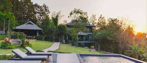 Outdoor pool, pool umbrellas, sun loungers