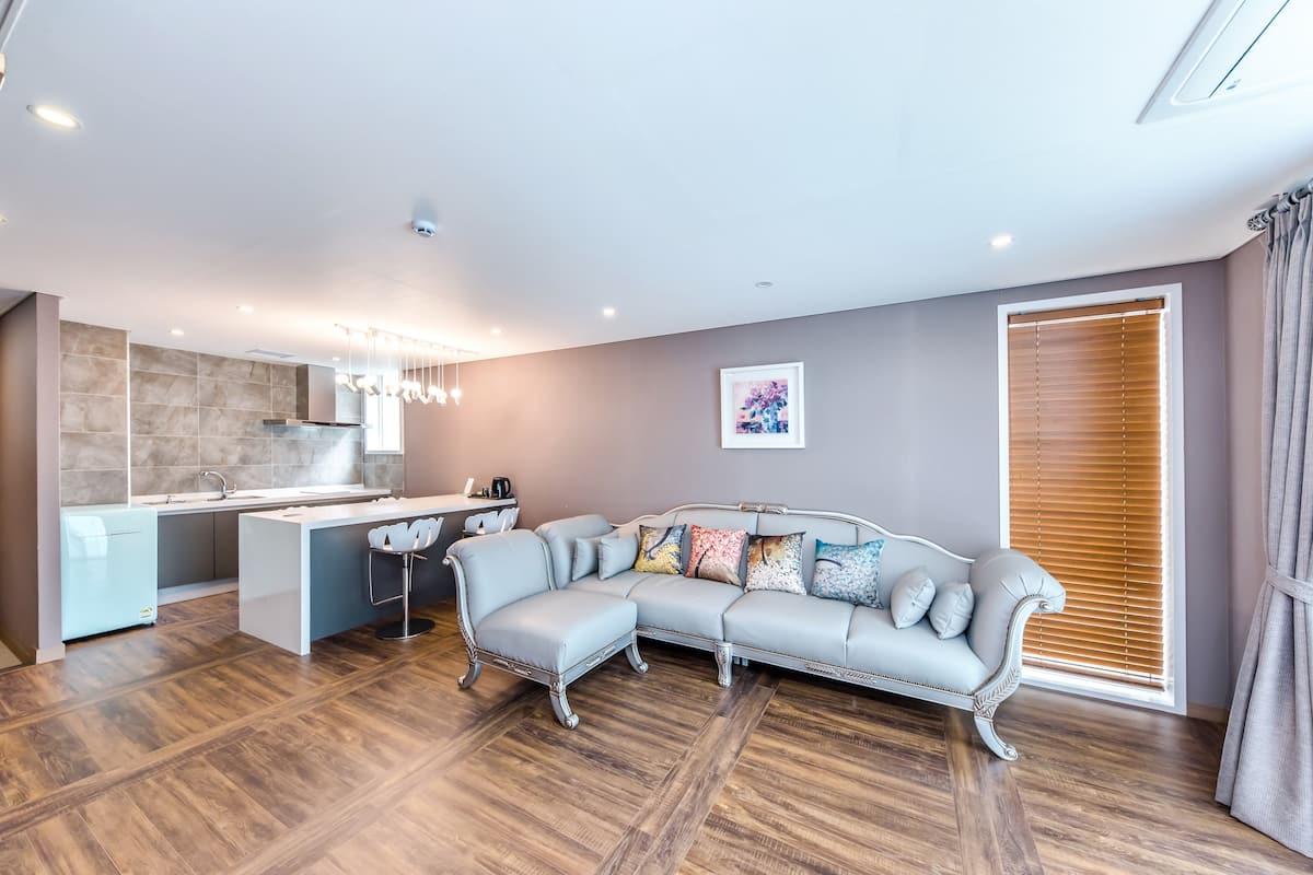 premium room, 2 queen beds | living area | 55-inch flat-screen tv with cable channels, tv