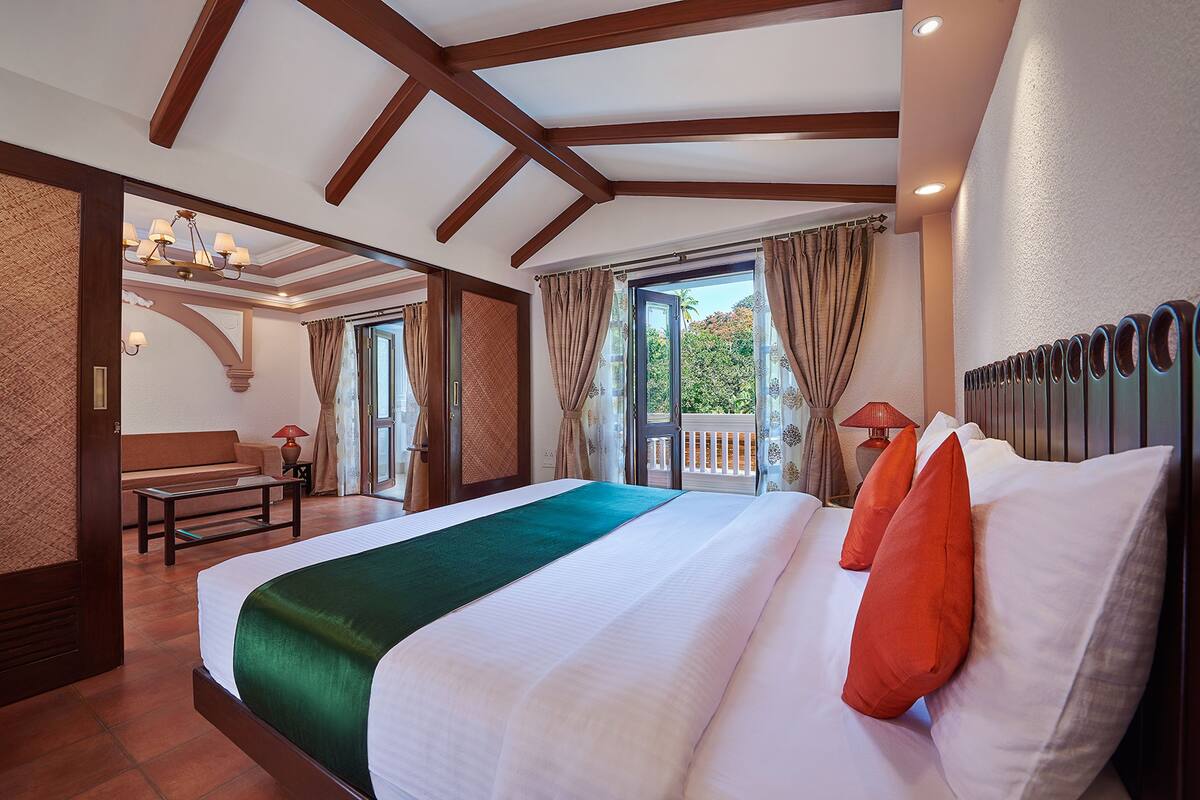 ห้องพรีเมียม, เตียงคิงไซส์ 1 เตียง, ปลอดบุหรี่, ระเบียง | 1 ห้องนอน, เตียงพร้อมฟูกเสริมที่นอน, พื้นที่ทำงานแบบใช้แล็ปท็อป