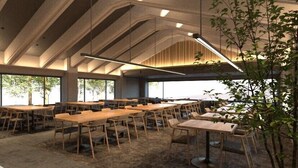 A spacious indoor area with multiple wooden tables and chairs, large windows, and a modern ceiling design. - Okutamaji (Ome)