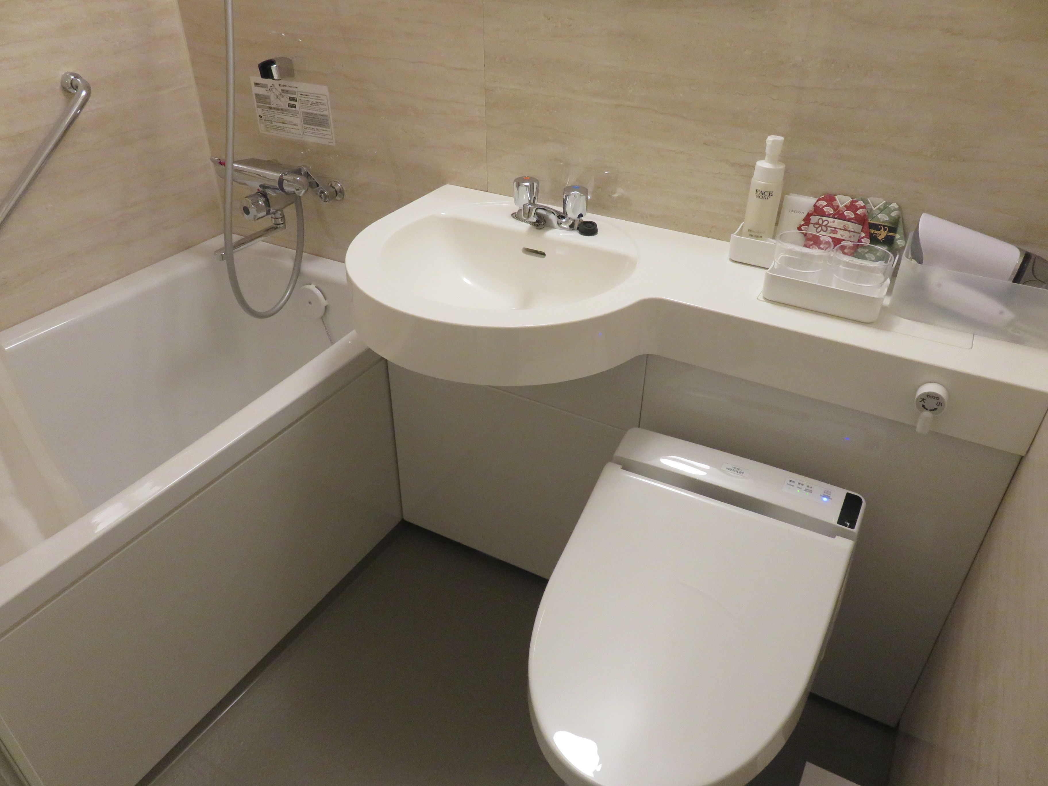 standard double room (check in by 10 pm) | bathroom | combined shower/bathtub, deep-soaking bathtub, free toiletries
