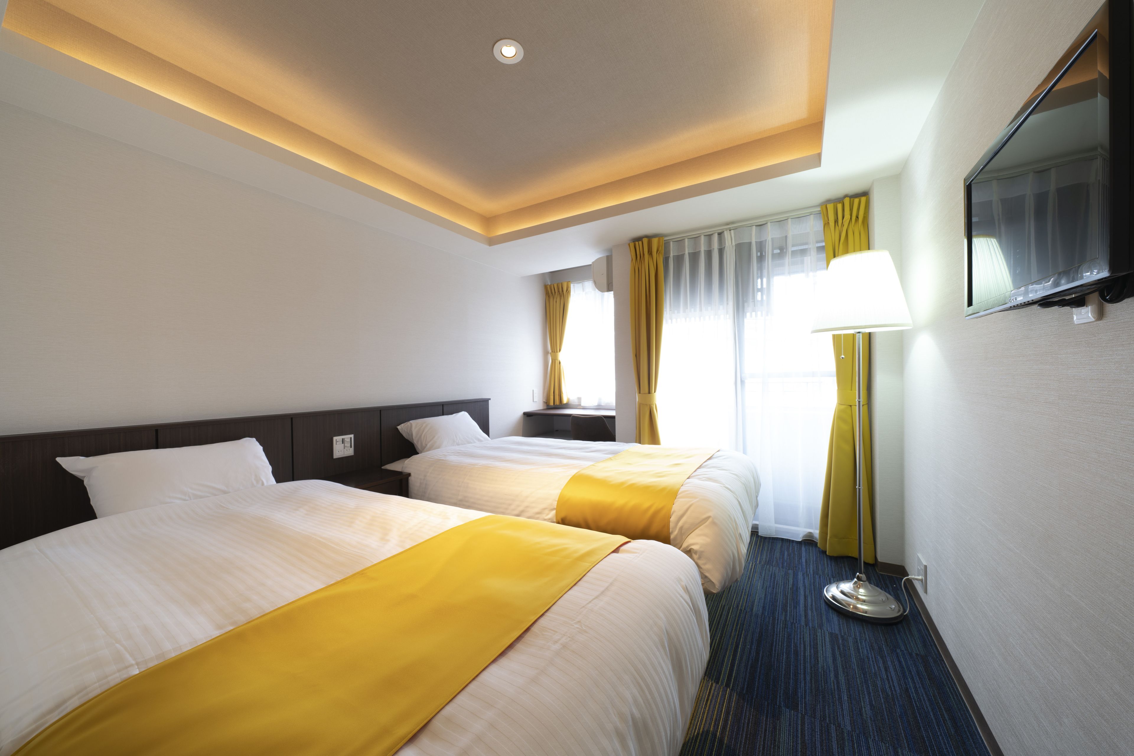 standard twin room, women only | desk, laptop workspace, blackout curtains, iron/ironing board