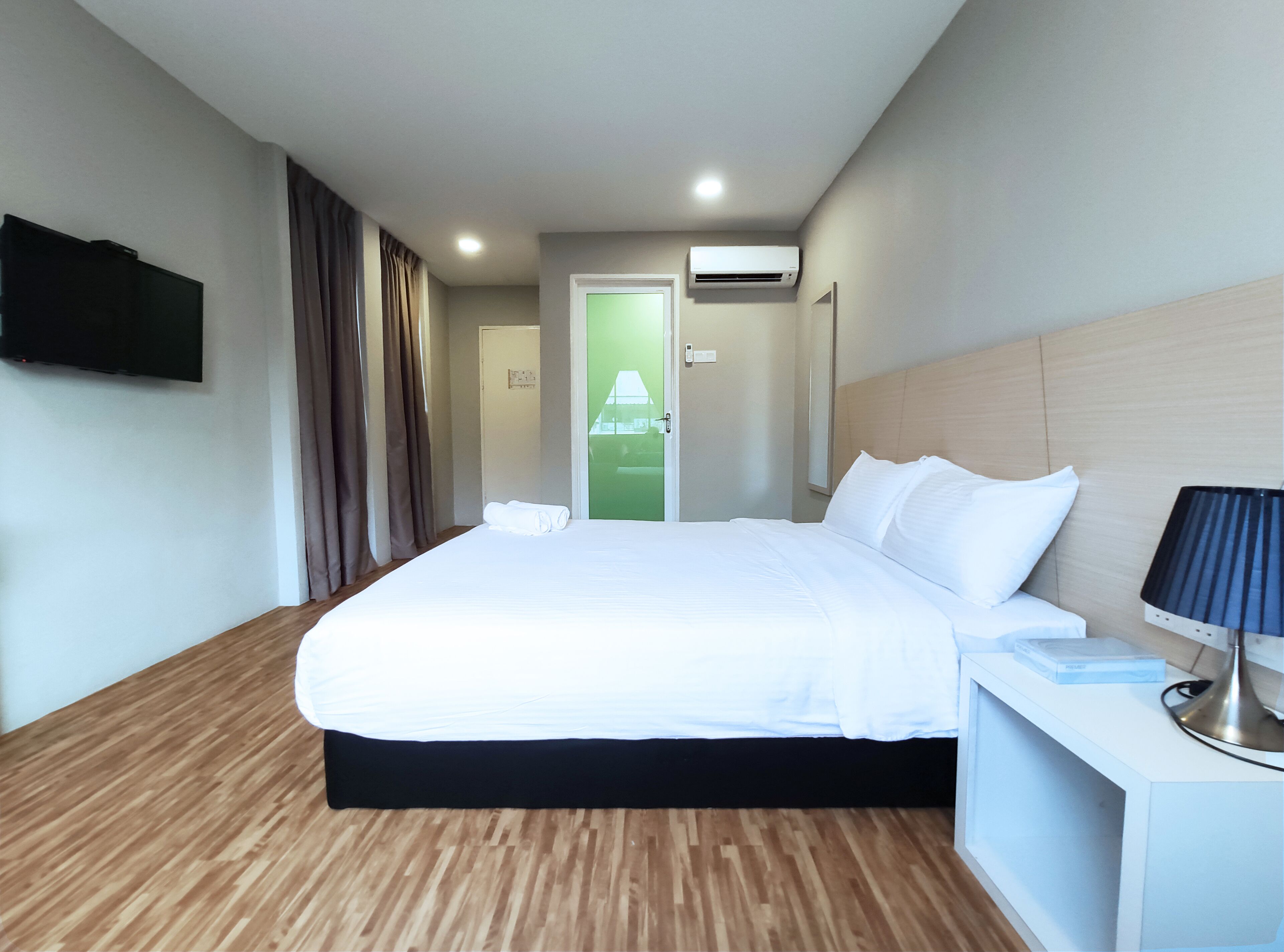 deluxe room | desk, laptop workspace, blackout curtains, iron/ironing board