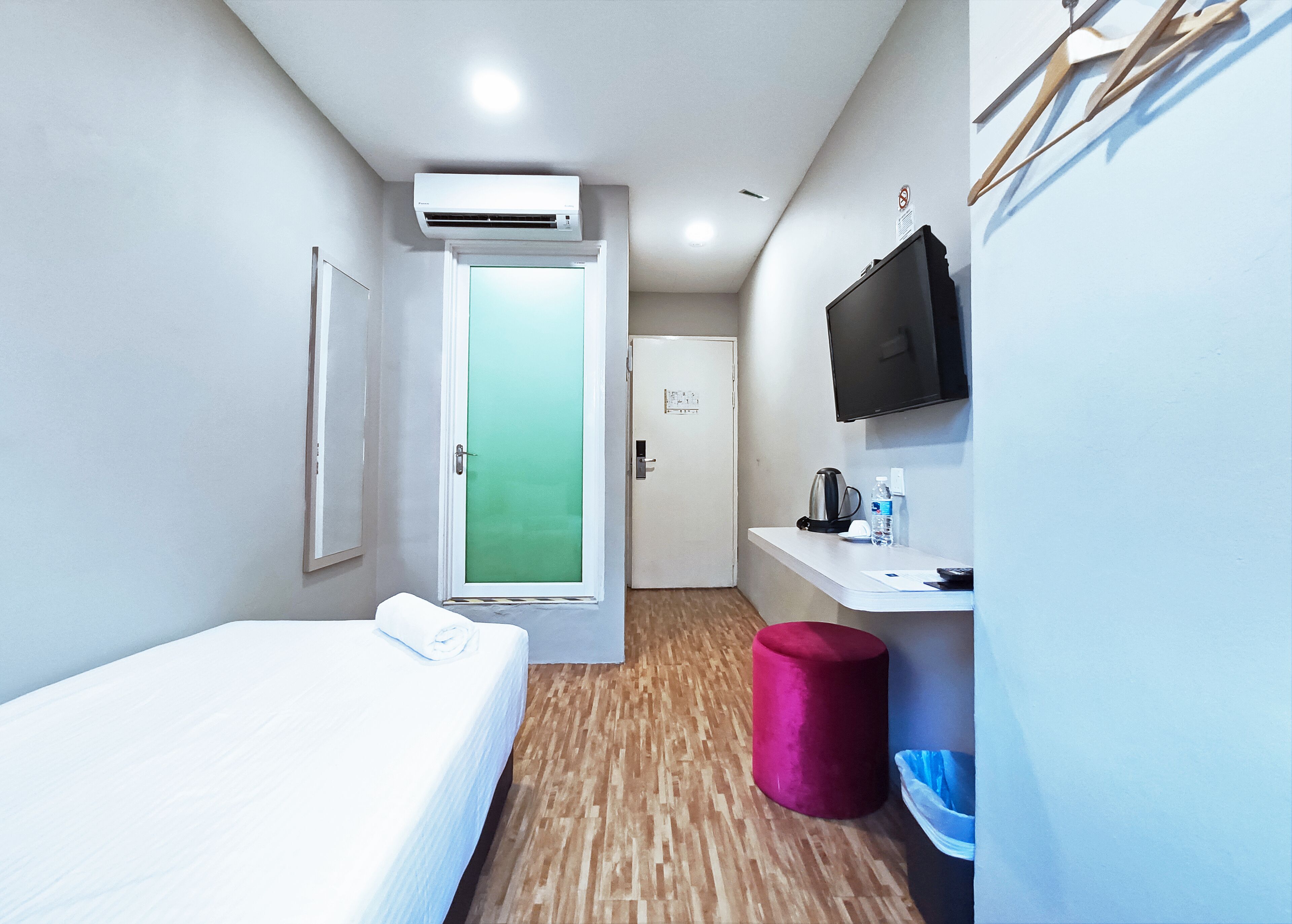 standard single room | desk, laptop workspace, blackout curtains, iron/ironing board