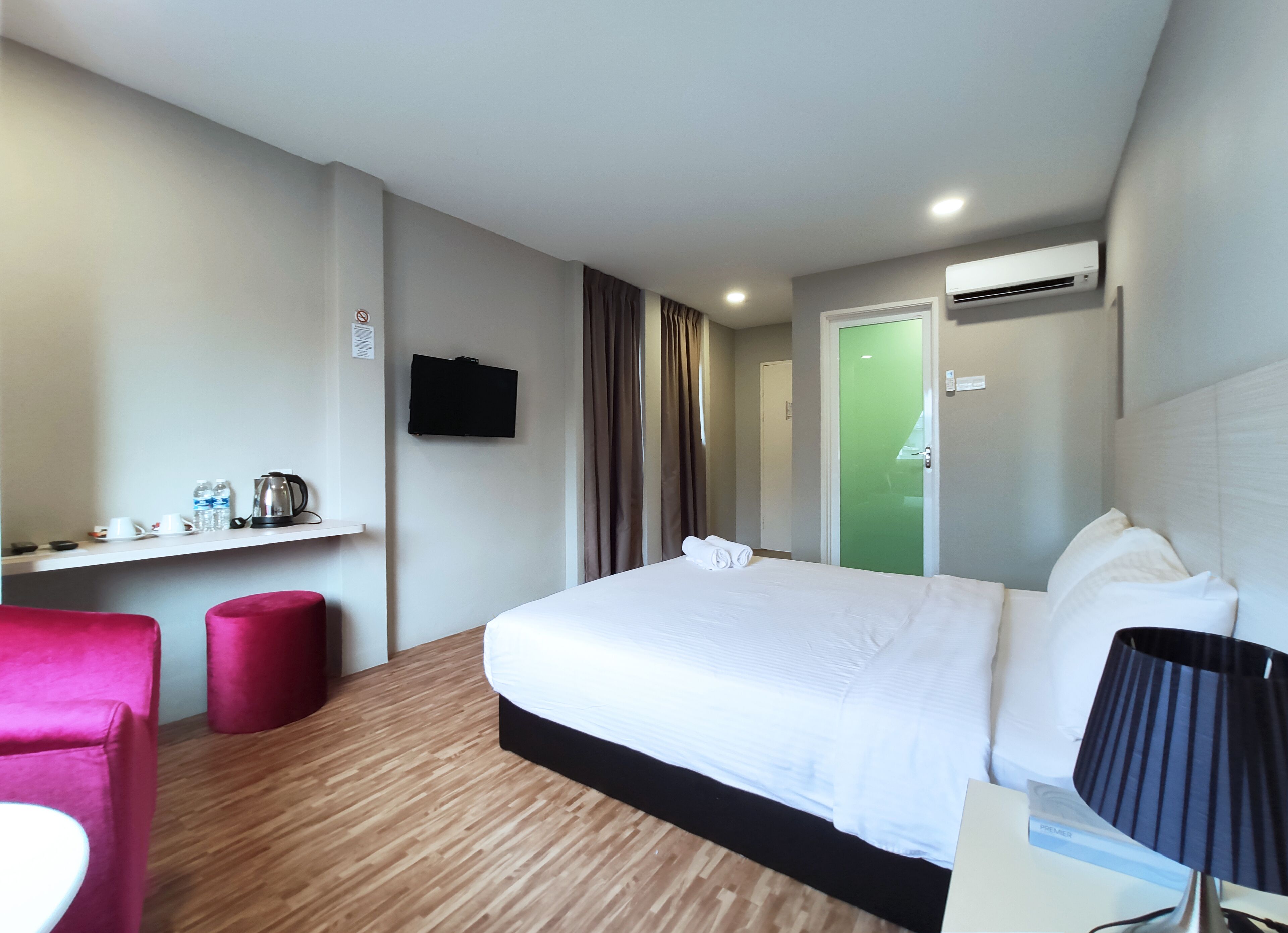 deluxe room | desk, laptop workspace, blackout curtains, iron/ironing board