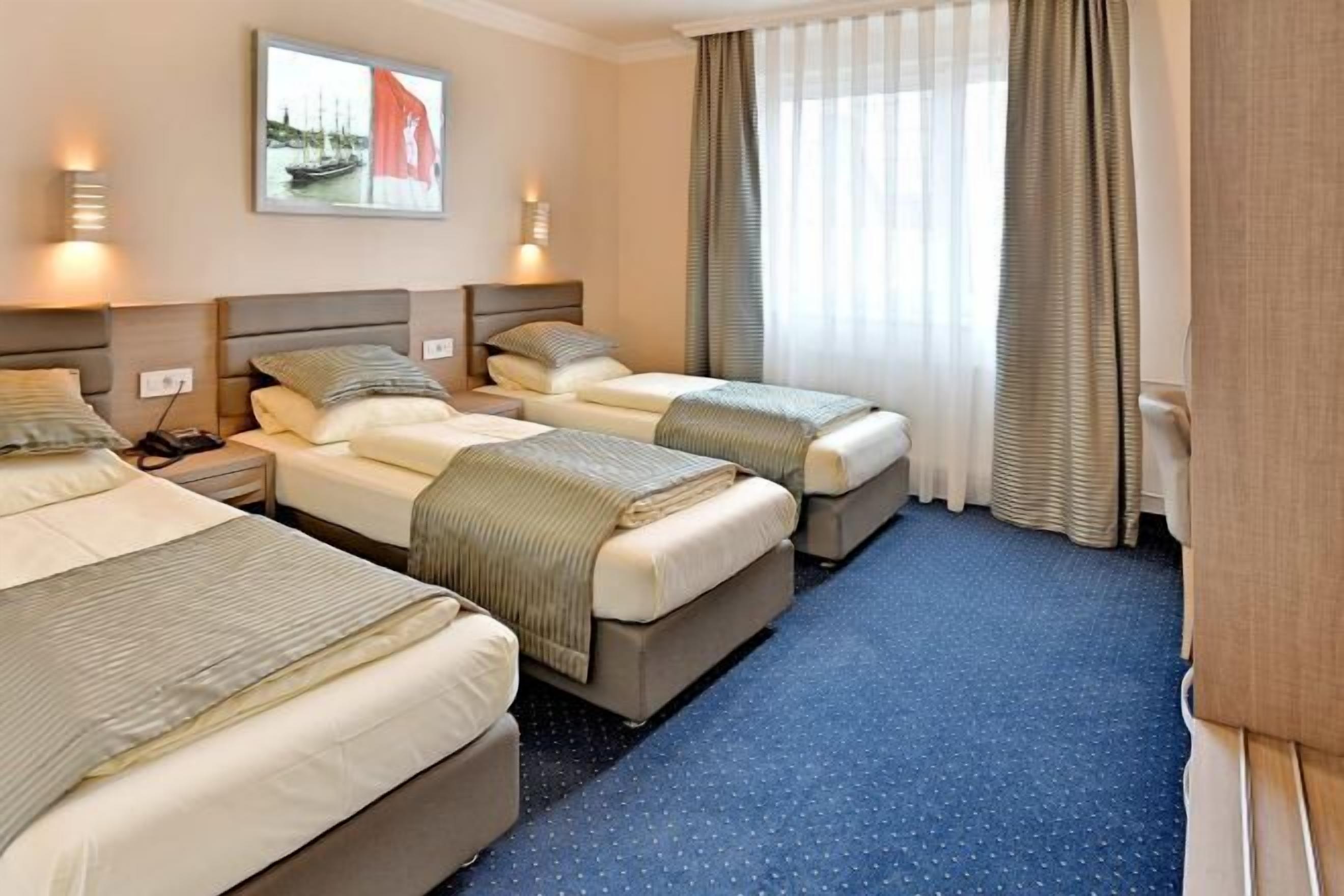 Hypo-allergenic bedding, in-room safe, desk, laptop workspace