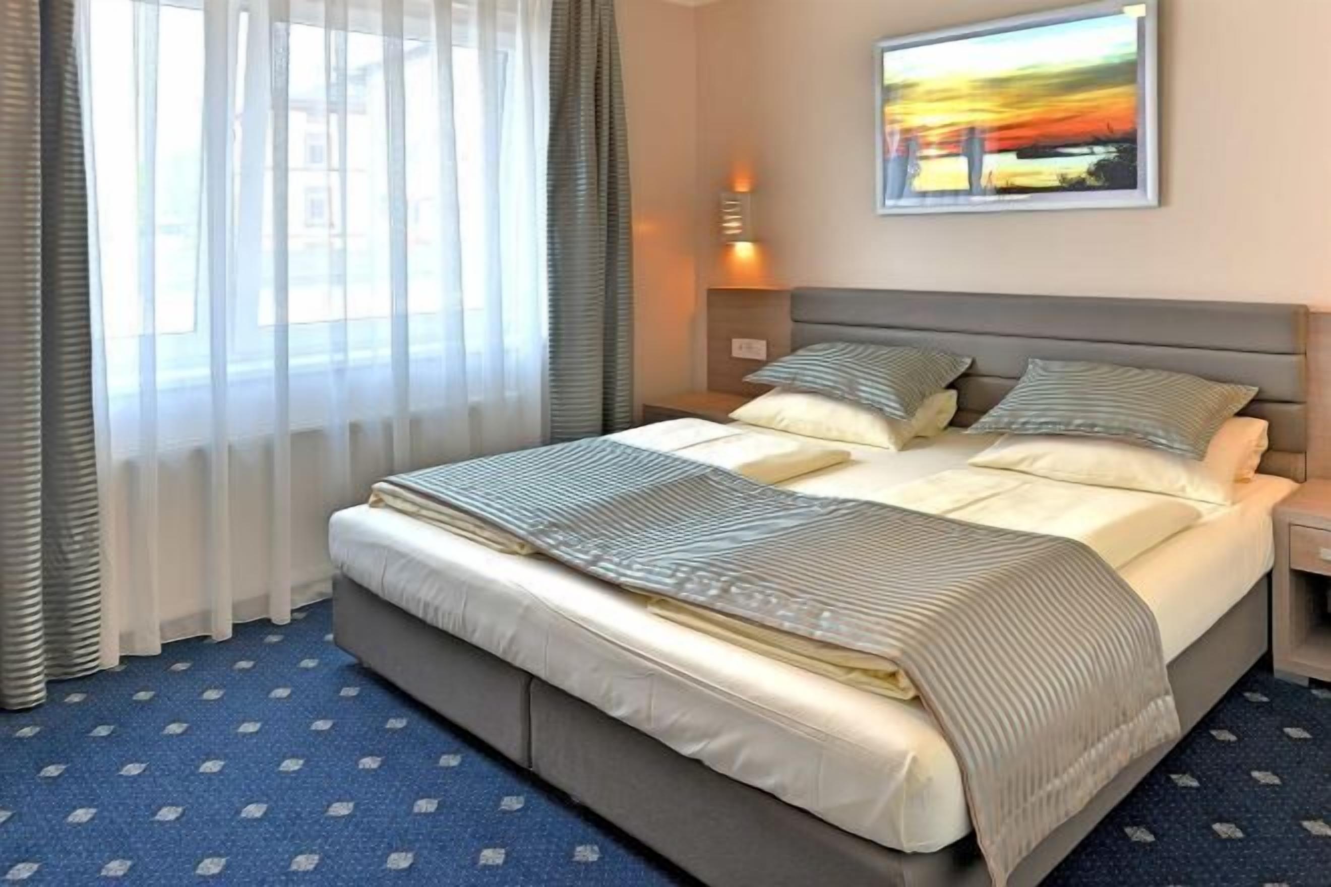 Hypo-allergenic bedding, in-room safe, desk, laptop workspace