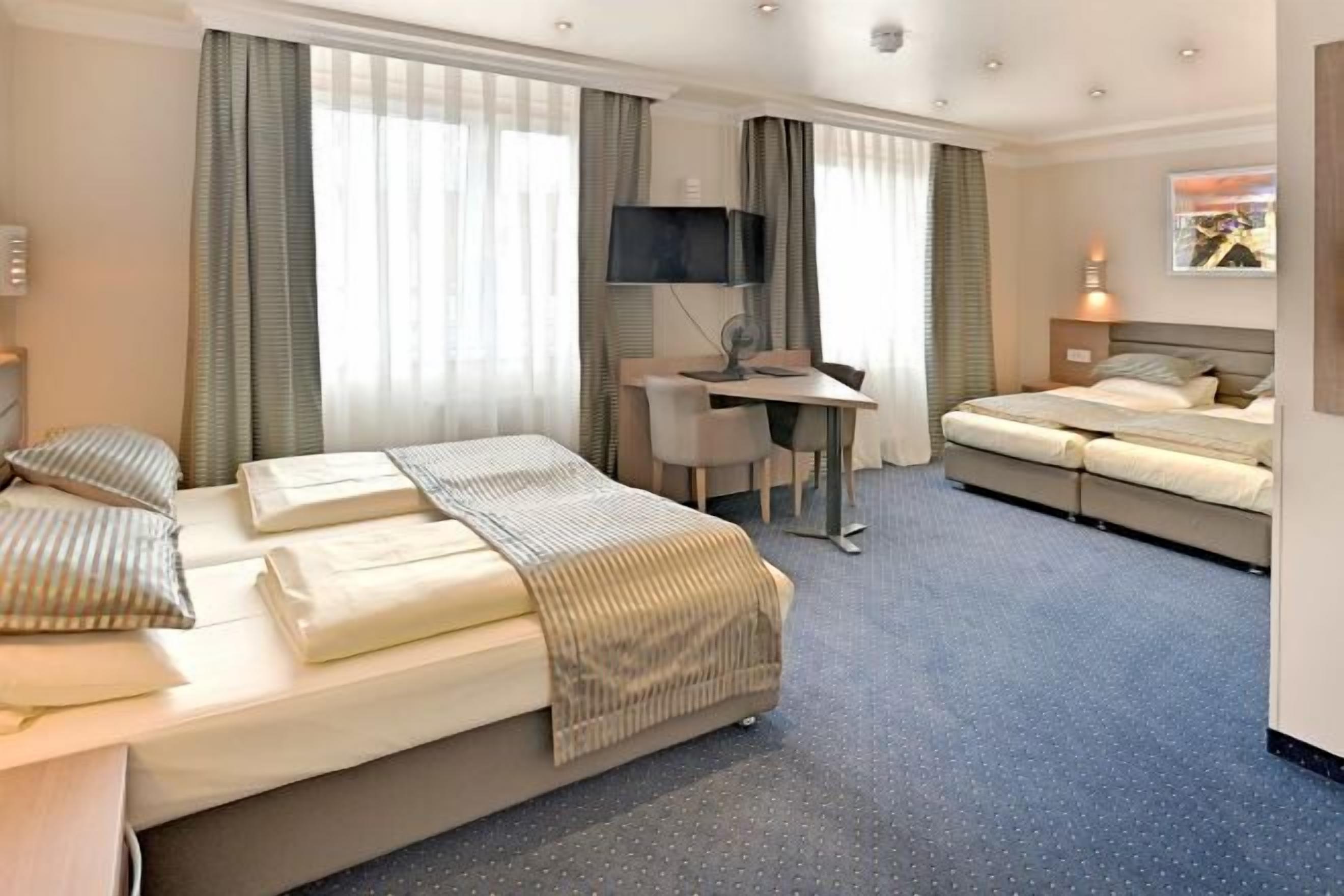 Hypo-allergenic bedding, in-room safe, desk, laptop workspace