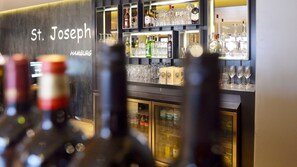 A bar area with a sign reading "St. Joseph Hamburg". - St Joseph Hotel Hamburg Reeperbahn St Pauli Kiez (Hamburg)