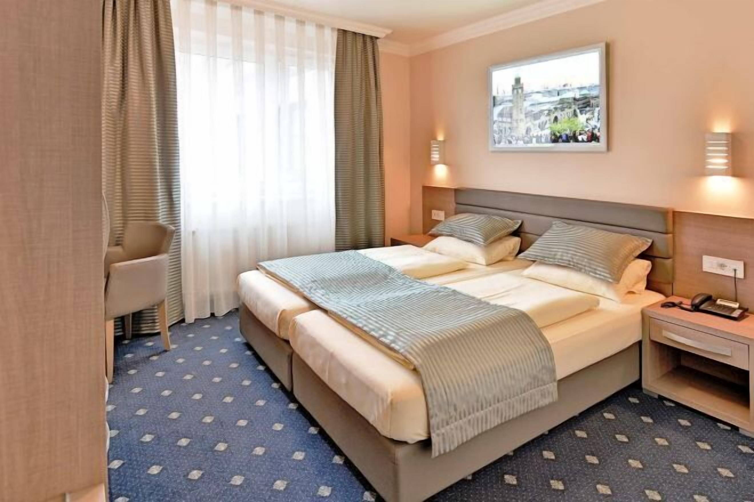 Hypo-allergenic bedding, in-room safe, desk, laptop workspace