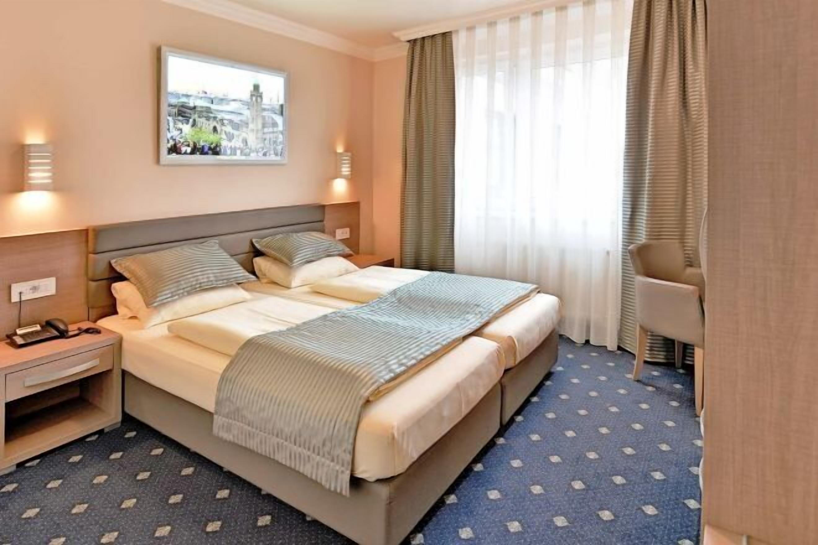 Hypo-allergenic bedding, in-room safe, desk, laptop workspace