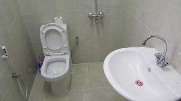 Shower, free toiletries, slippers, towels