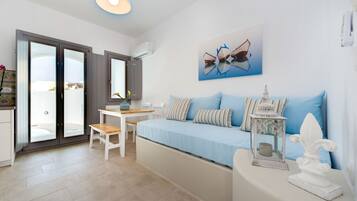 Suite, Private Pool, Sea View | Living area | Flat-screen TV
