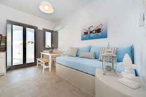 Suite, Private Pool, Sea View | Living area | Flat-screen TV
