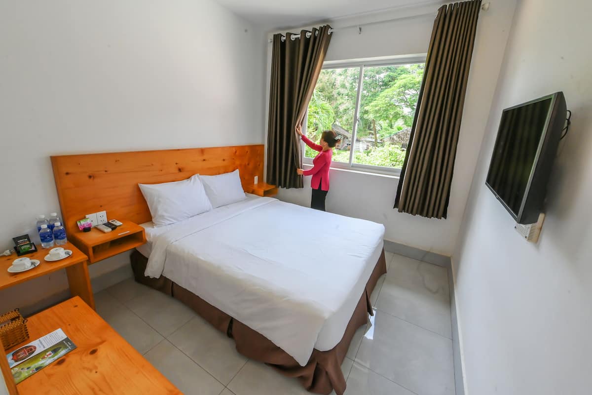 Economy-huone, 1 keskisuuri parisänky, piha-alue (with Window, Villa Area) | Minibaari, pimennysverhot, ilmainen Wi-Fi, vuodevaatteet