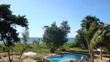 Outdoor pool, pool umbrellas, pool loungers