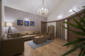 Premier Villa, 3 Bedrooms | Living area | Flat-screen TV - Olive Resorts & Villas (Kurai)