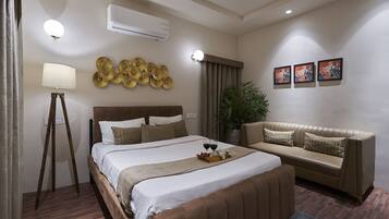 Desk, iron/ironing board, bed sheets