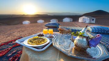 Breakfast, lunch, dinner served; local cuisine