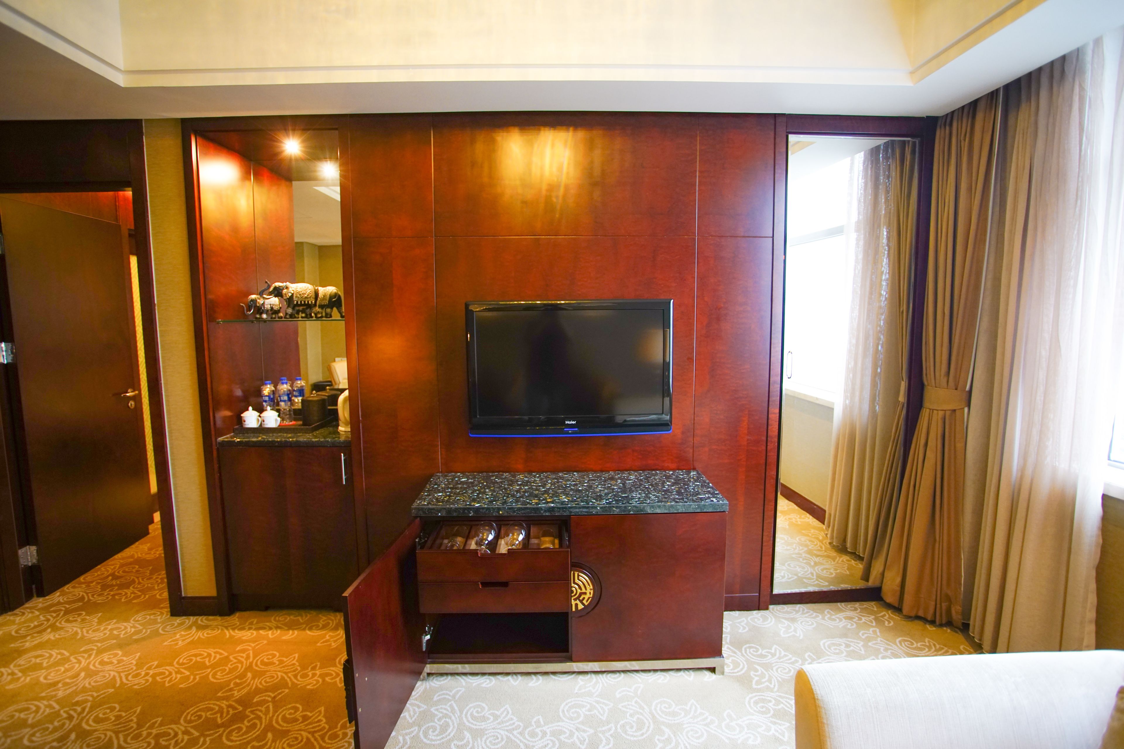 deluxe suite | in-room safe, desk, blackout curtains, soundproofing