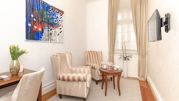 Superior Suite | Living area | Flat-screen TV