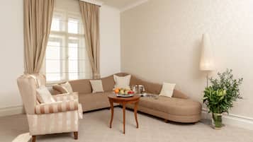 Deluxe Suite | Living area | Flat-screen TV