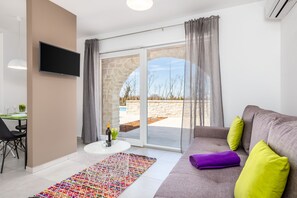 Appartement, 1 grand lit et 1 canapé-lit, terrasse (Agava) | Coin séjour