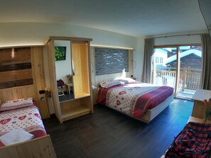 Triple Room, 1 Bedroom, Balcony | Desk, laptop workspace, free WiFi - B&B Carpe Diem (Livigno)