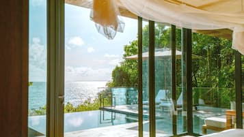 Ocean Front Pool Villa Suite | 1 bedroom, premium bedding, down duvets, in-room safe