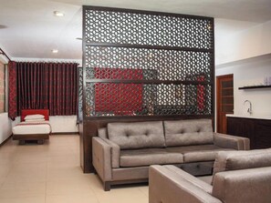 Executive Suite, Sea View | Living area | Flat-screen TV