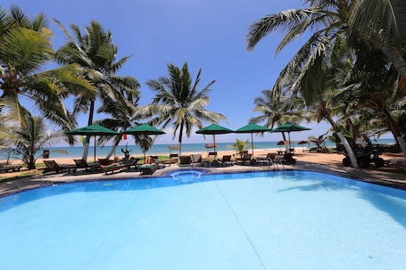 Outdoor pool. Joe's Resort Bentota