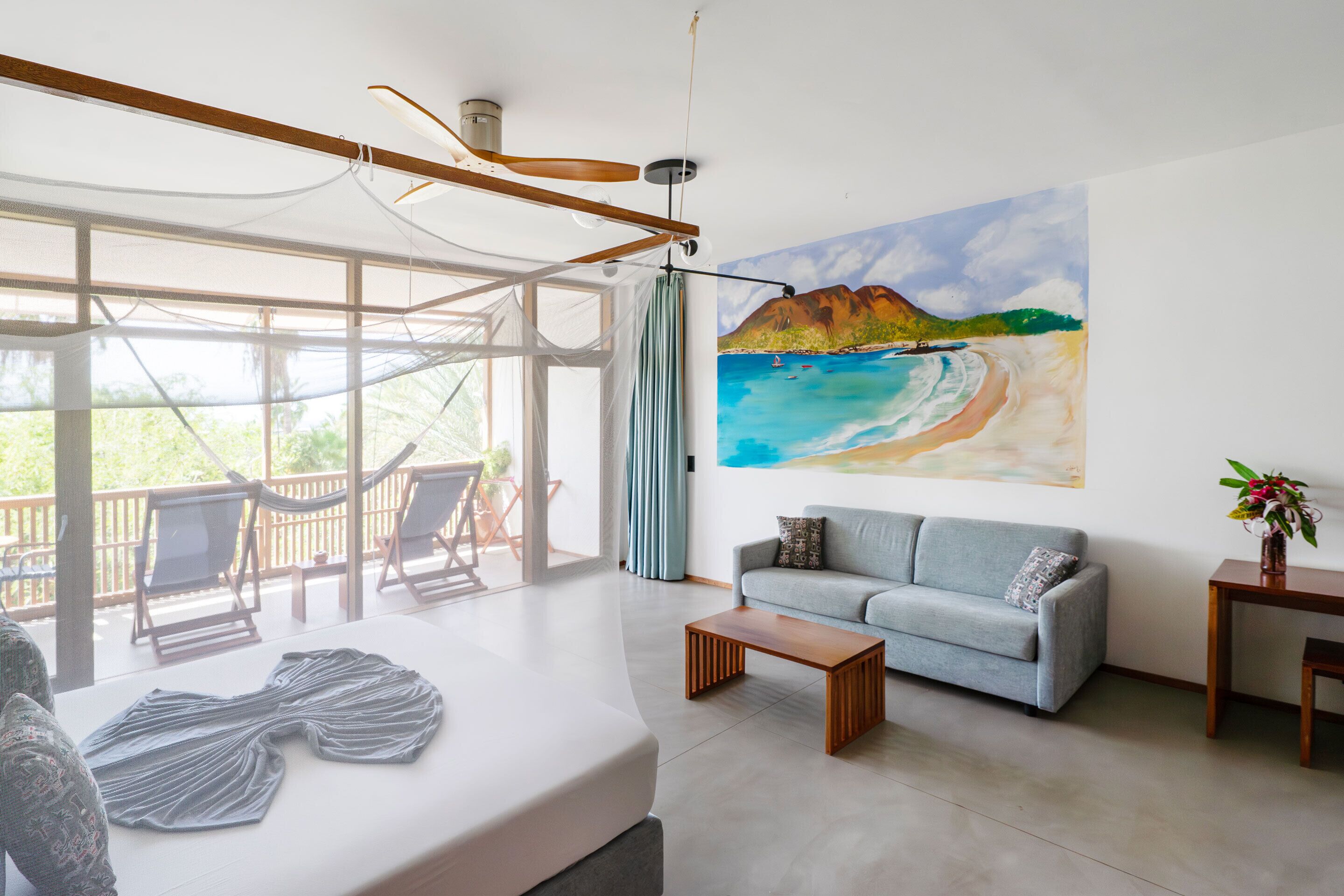 Deluxe Double Room, Partial Sea View | Minibar, in-room safe, free WiFi, bed sheets