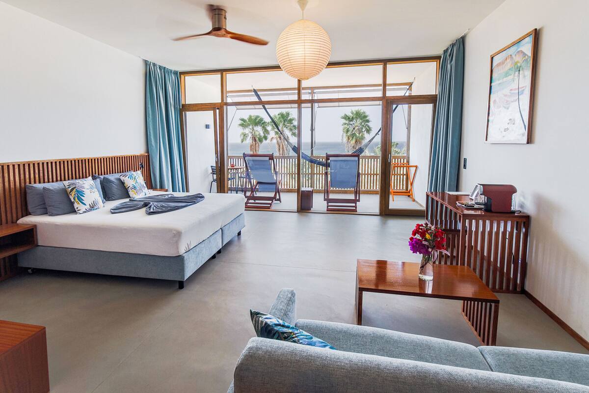 panoramic double room, sea view | 1 bedroom, minibar, in-room safe, free wifi