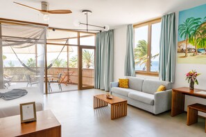 Habitación panorámica doble, vistas al mar | Zona de estar