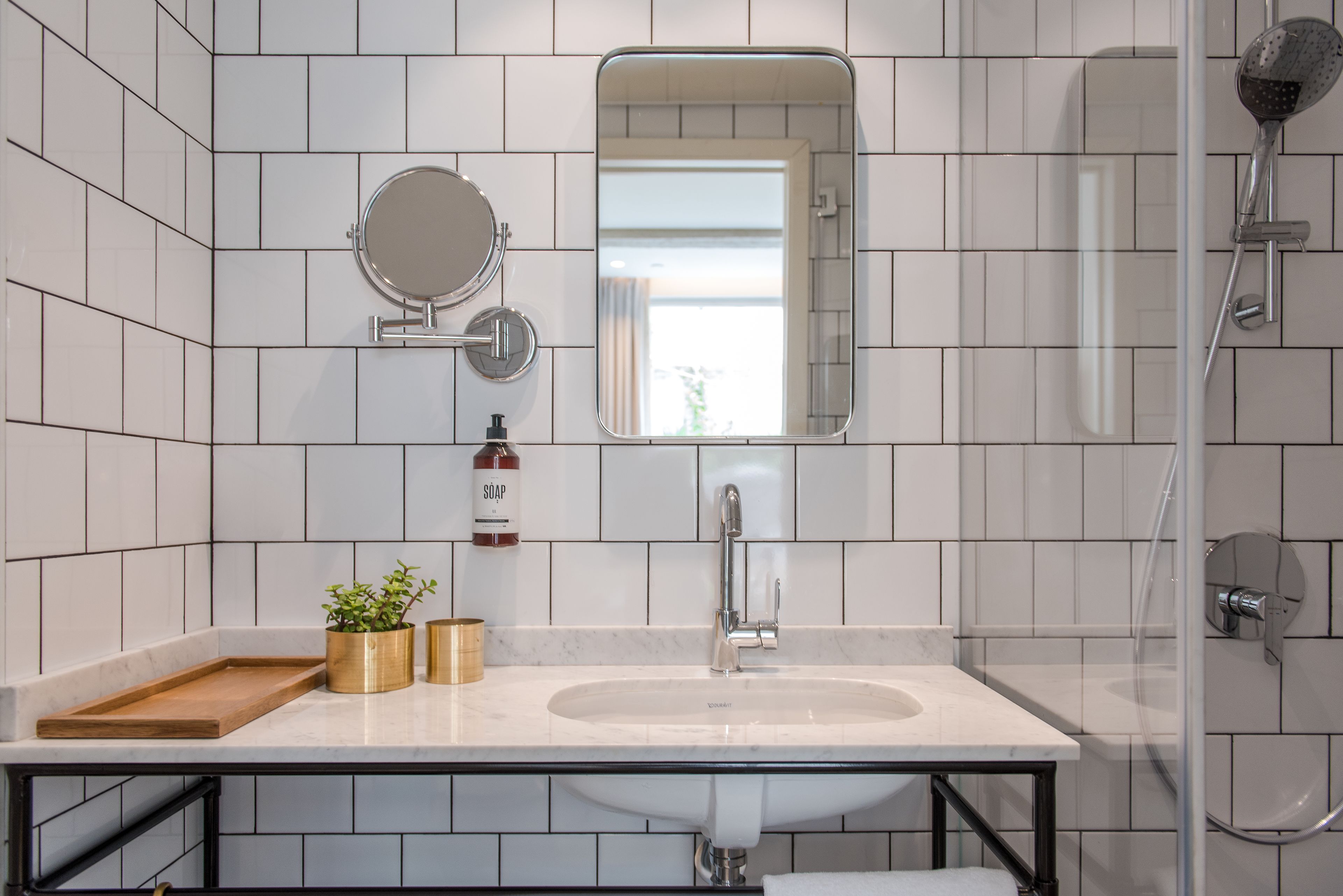 standard single room | bathroom | shower, rainfall showerhead, eco-friendly toiletries, hair dryer