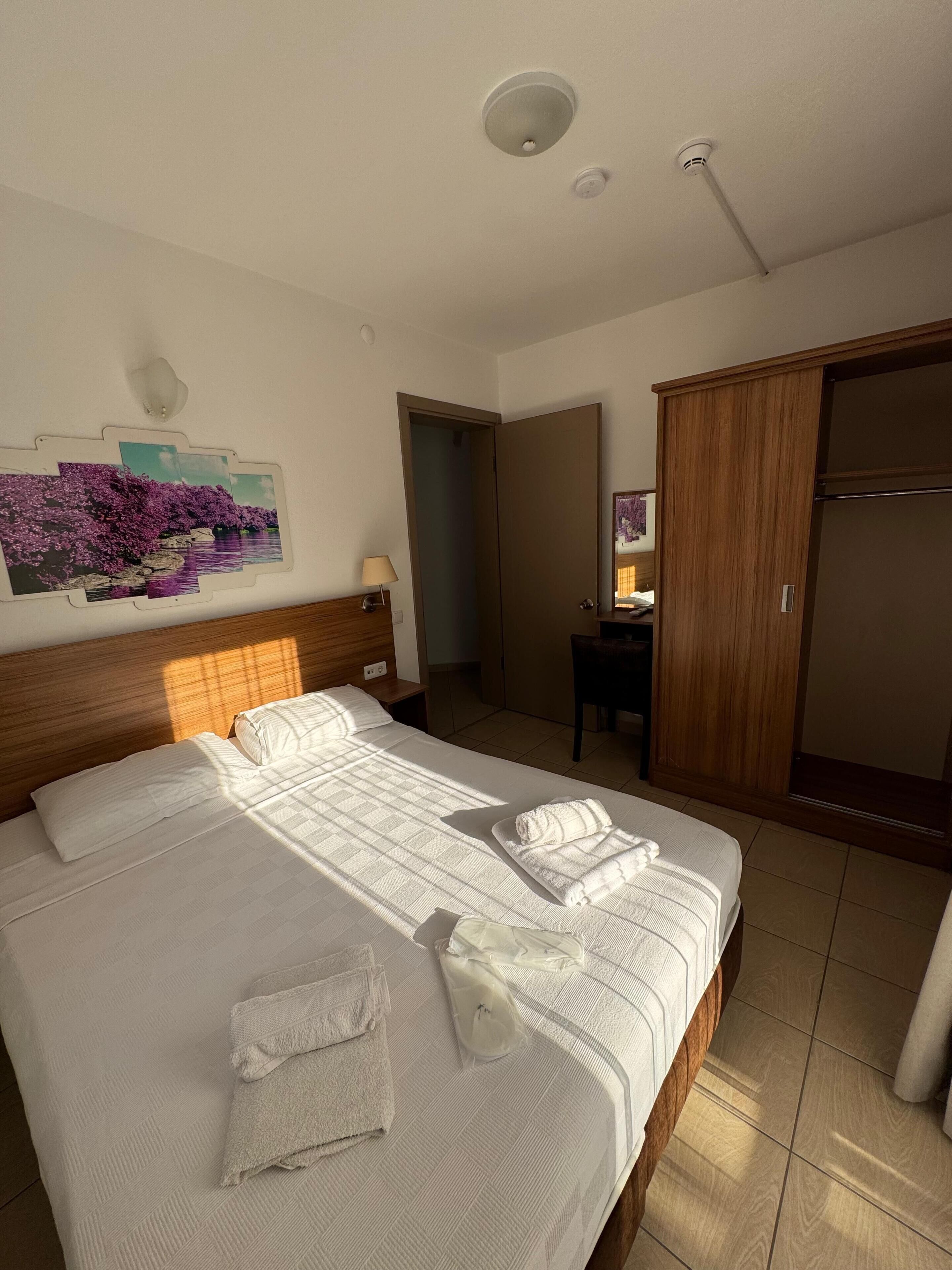 Quadruple Room, River View | Desk, laptop workspace, free WiFi, bed sheets