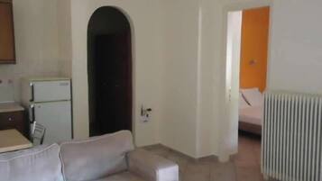 Double Room, Garden View | Living area | Plasma TV