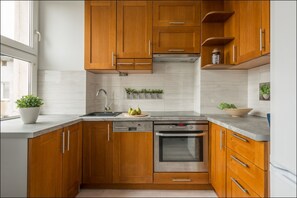 Apartment (Chmielna 3) | Private kitchen | Fridge, oven, stovetop, dishwasher - P&O Apartments Chmielna (Warsaw)