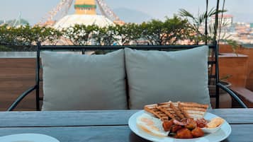 Breakfast, lunch, dinner served; garden views