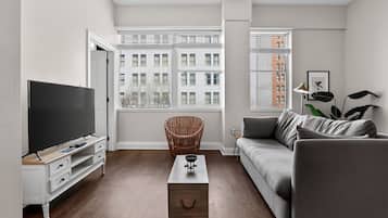 Standard Apartment, 1 Bedroom | Living area | 36-inch flat-screen TV with digital channels, TV