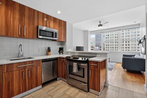 Adjacent Two Bed Two Bath Apartment | Private kitchen | Fridge, microwave, oven, coffee/tea maker - Roami at Duncan Plaza (New Orleans)