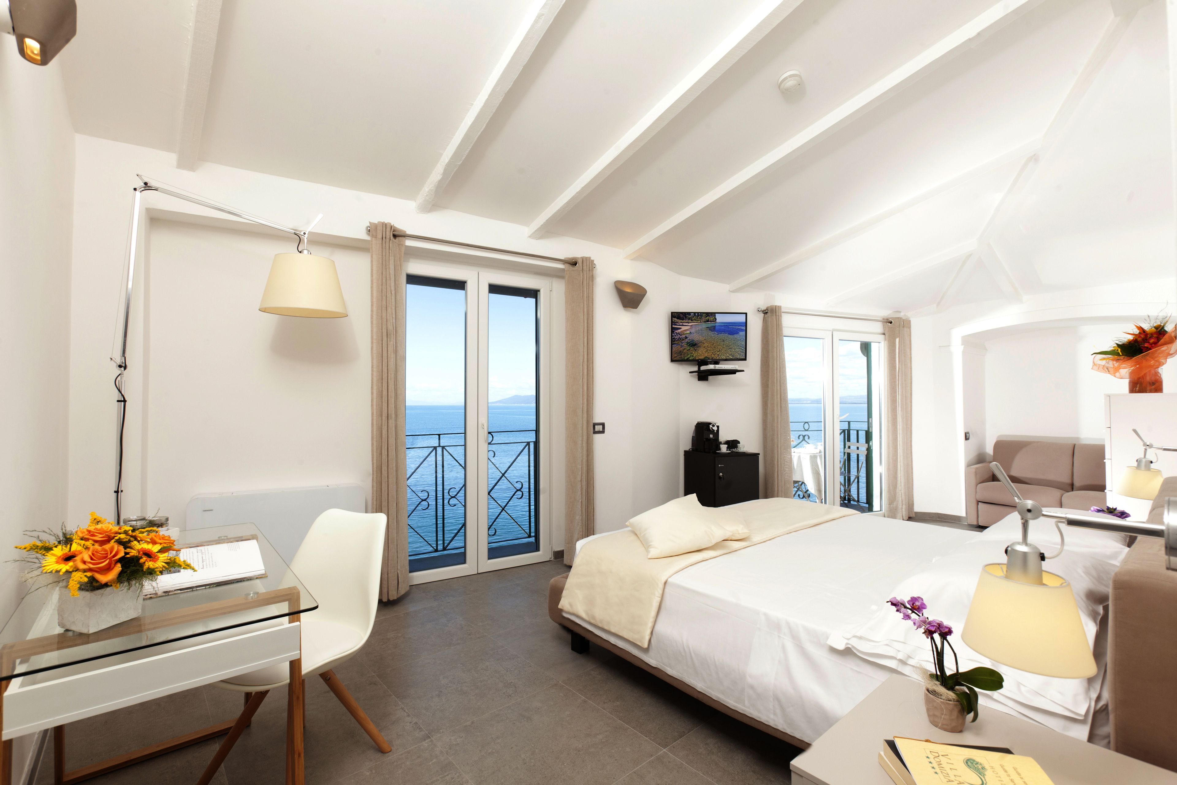 junior suite, balcony, sea view | 1 bedroom, premium bedding, down duvets, minibar
