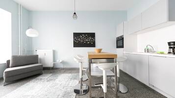 City Apartment, 1 King Bed | 1 bedroom, laptop workspace, iron/ironing board, free cots/infant beds