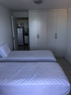Apartamento, 2 quartos | 2 quartos, escrivaninha, cortinas blackout, Wi-Fi de cortesia
