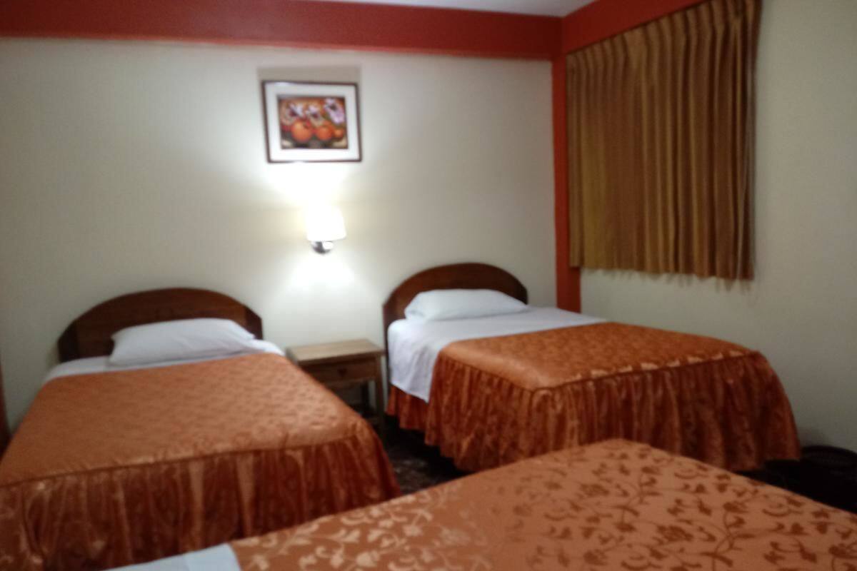 Habitación triple, 3 camas individuales | Wifi gratis y ropa de cama