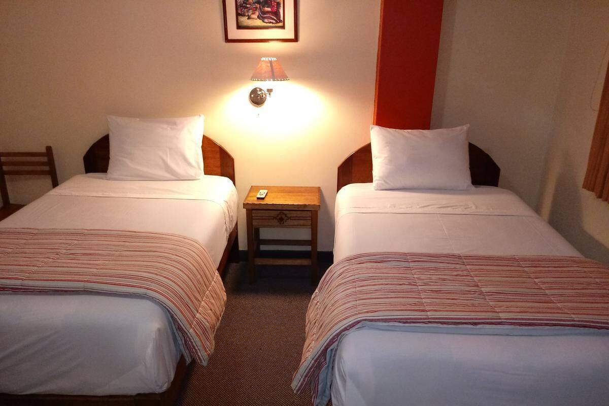 Quarto duplo, 2 camas de solteiro | Wi-Fi de cortesia, roupa de cama