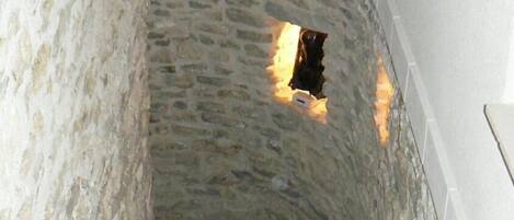 A stone staircase leading to a lower level.