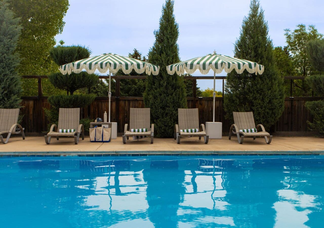 Seasonal outdoor pool, open 11:00 AM to 10:00 PM, sun loungers