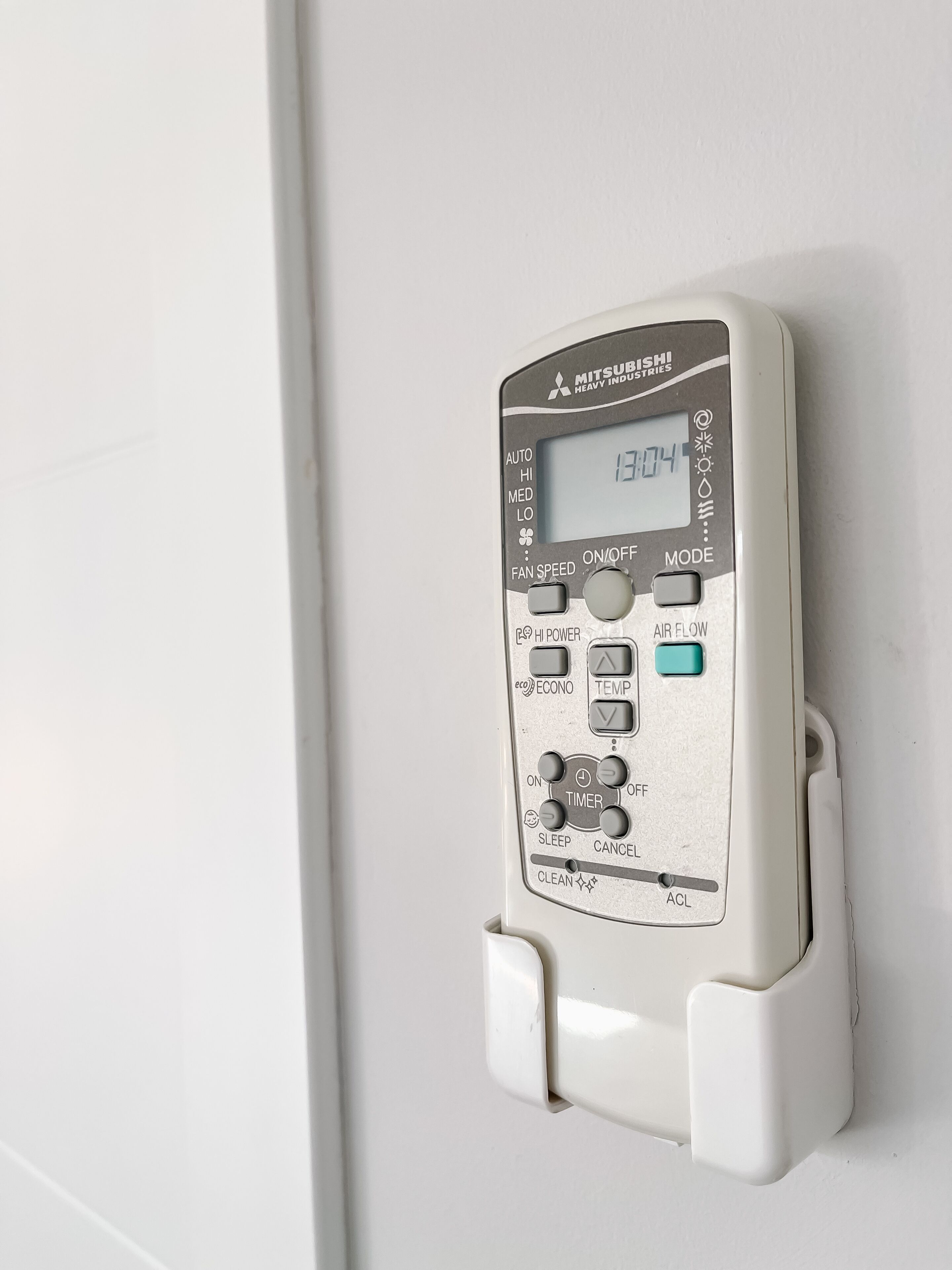 A Mitsubishi heavy industries air conditioning unit mounted on a wall.